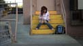 anna_on_yellow_steps